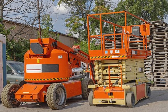 heavy-duty forklift maneuvering through a busy warehouse in Burbank WA